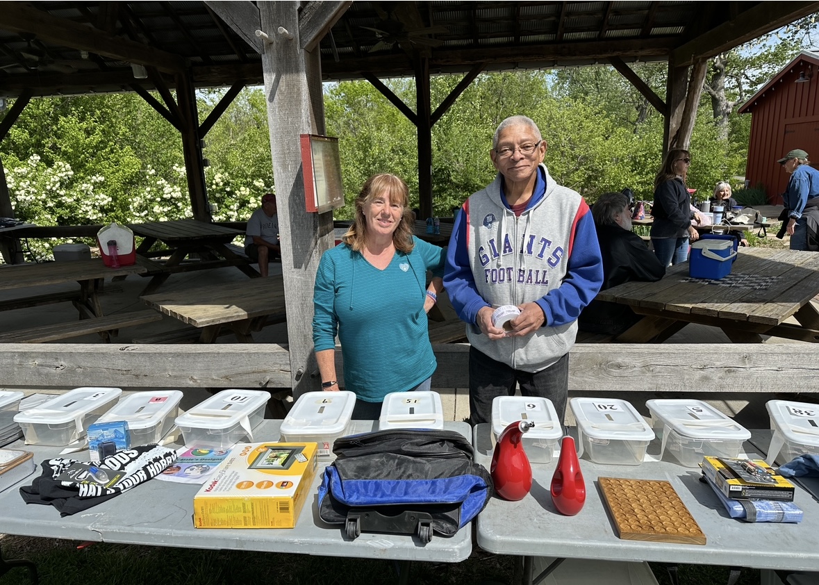 Spring picnic 2024 silent auction table NE girl and sleddog